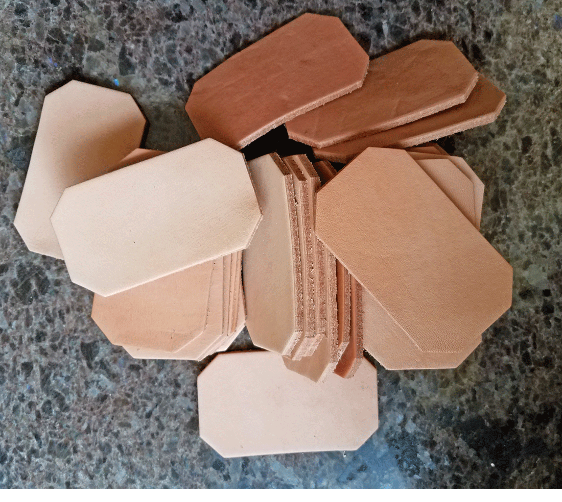 Die cut leather clipped corner rectangles